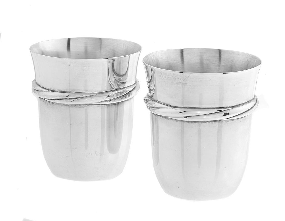 Pair of Italian Cartier Sterling Silver Beakers: Pair of Italian Cartier Sterling Silver Beakers fourth quarter 20th century, manufactured by Rino Greggio Argenterie, Padua, for Cartier, each of timbale form with embossed rope-twist band. h. 3", dia