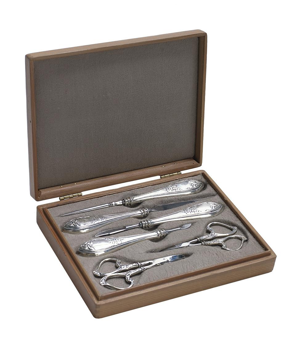 Cased Art Nouveau Sterling Silver Manicure Set: Cased American Art Nouveau Sterling Silver Manicure Set first quarter 20th century, by Theodore W. Foster & Bro. Co., Providence, Rhode Island, including: nail scissors, l. 4"; cuticle scissors, l. 4-