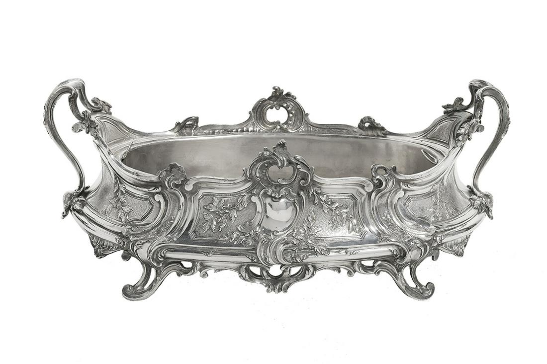 French Silverplate Jardiniere: French Silverplate Jardiniere ca. 1900, in the Louis XVI taste, of oval form, decorated with rococo panels of foliage on a matte ground framed by acanthus scrolls extending to form the feet, with appl