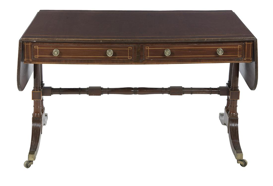 Regency-Style Mahogany Sofa Table: Regency-Style Mahogany Sofa Table late 19th century, the banded rectangular top with a rounded drop leaf to either end, above a frieze fitted with two drawers to one side and two faux drawers to the o