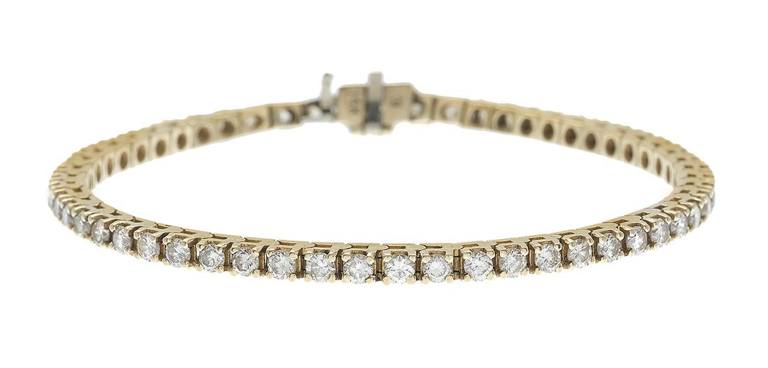 Diamond Tennis Bracelet: Diamond Tennis Bracelet 14k yellow gold, the bracelet mounted with round brilliant-cut diamonds weighing approximately 3.50 carats in total. l. 7", total weight 10.8 grams