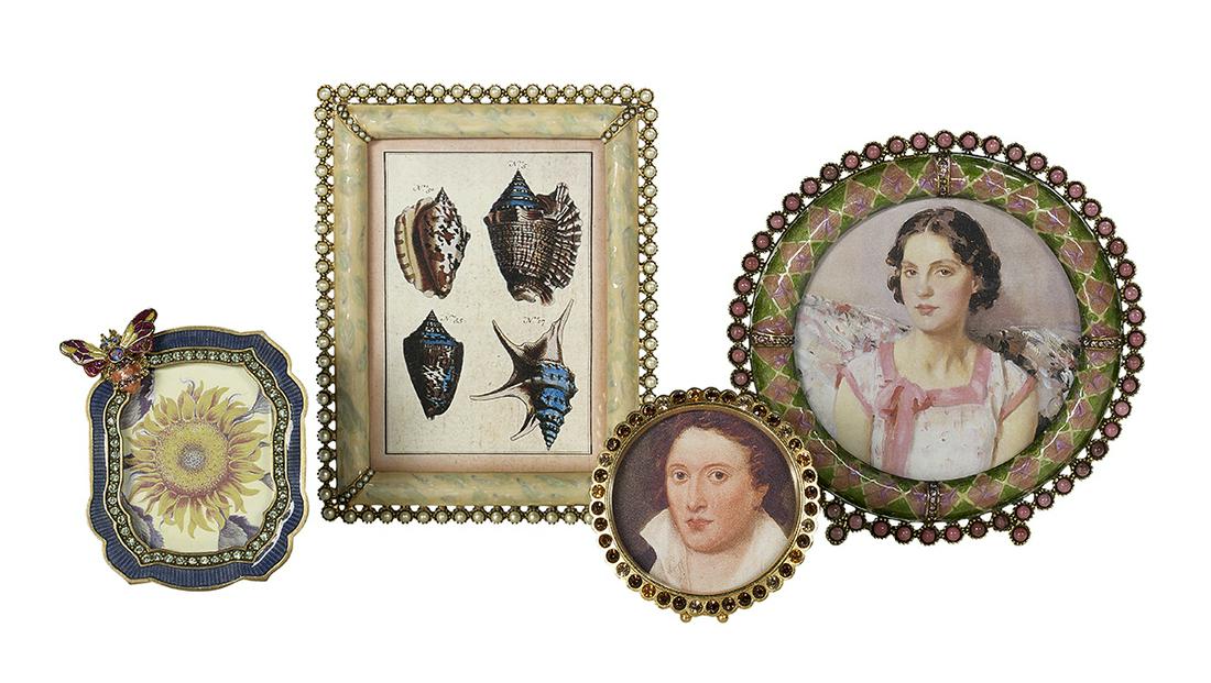 Four Jay Strongwater Small Table Frames: Four Jay Strongwater Small Table Frames including a circular cabochon-edged pink and green argyle enamel example, dia. 5", a pearl-set marbleized enamel rectangular example, h. 5-1/4", w. 4-1/8", a sh