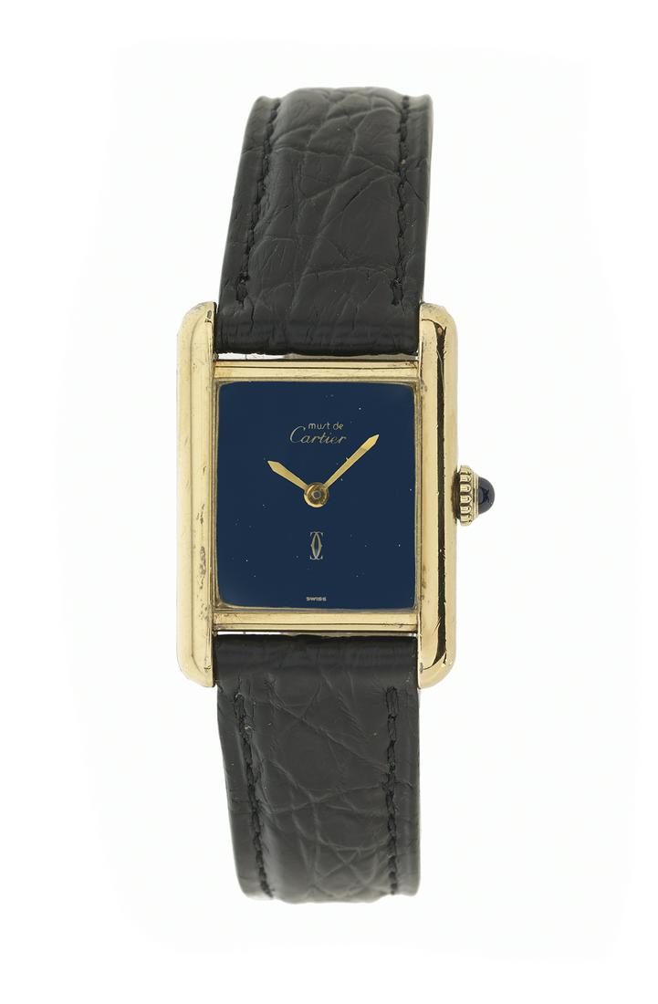 Lady's Cartier Tank Watch: Lady's Cartier Tank Watch gold vermeil, the manual wind mechanical time only movement with a blue dial signed "Must de Cartier", with interlocking CC logo, serial #3 069, XXX, size 21.0 mm x 28.0 mm,