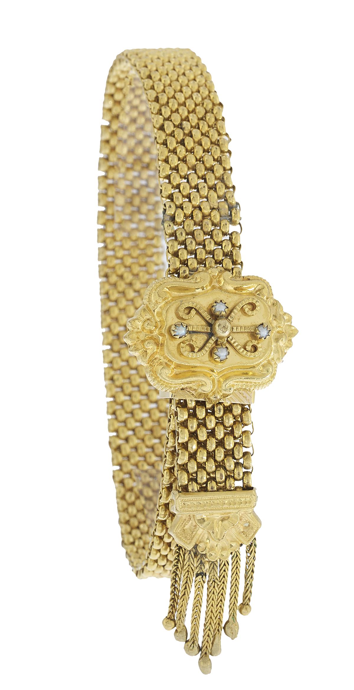 Victorian Seed Pearl Bracelet: Victorian Seed Pearl Bracelet gold filled, the adjustable sliding rice link bracelet with a buckle set with seed pearls, and finished with a tassel. inside circumference 8-1/2", total weight 17.4 gram