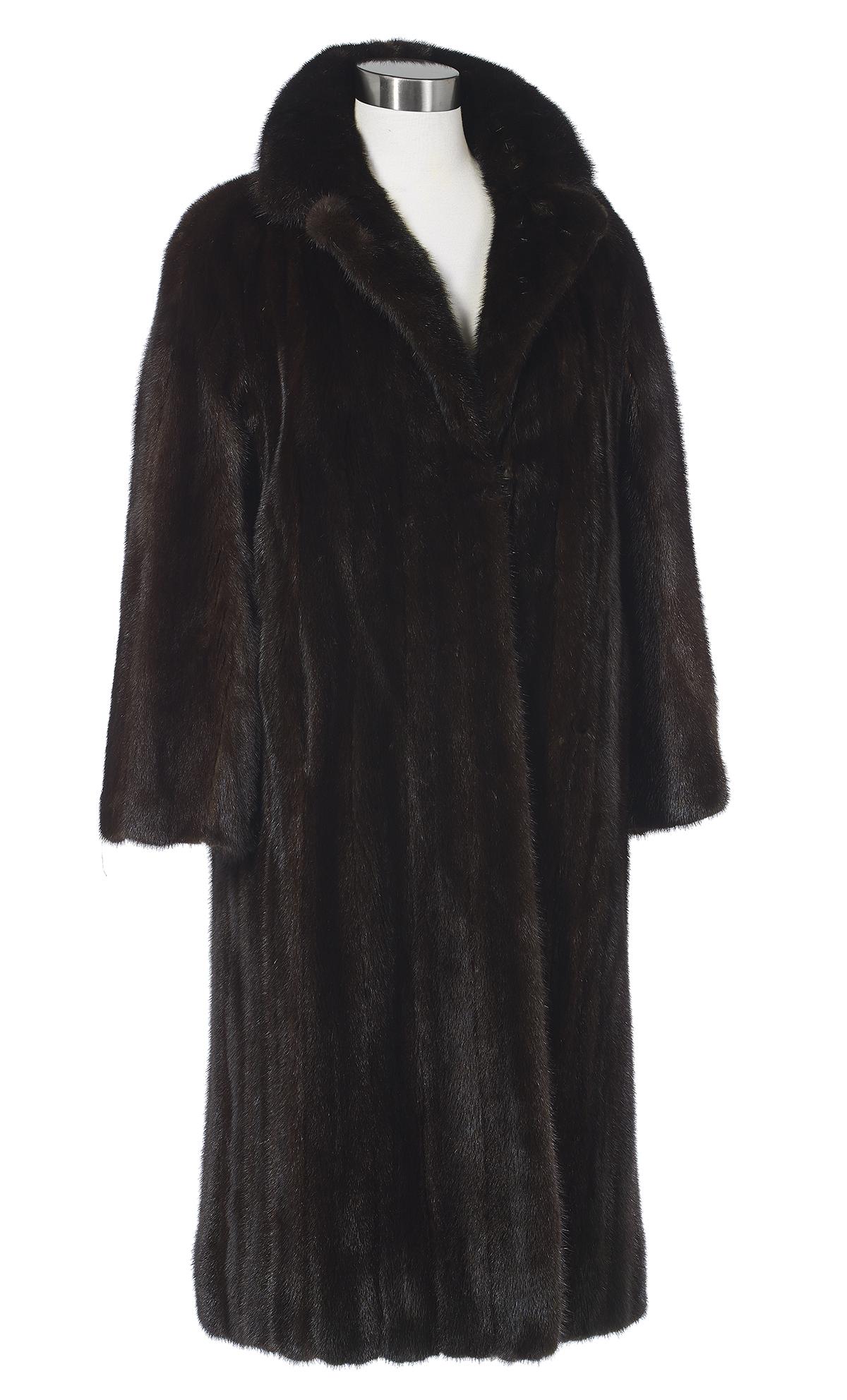 Dark Chocolate Brown Mink Coat: Dark Chocolate Brown Mink Coat size 6-8, with notched lapels, straight sleeves, molded shoulders, four hook closure and two on-seam pockets, the black satin-lined interior with self tie and forward gl