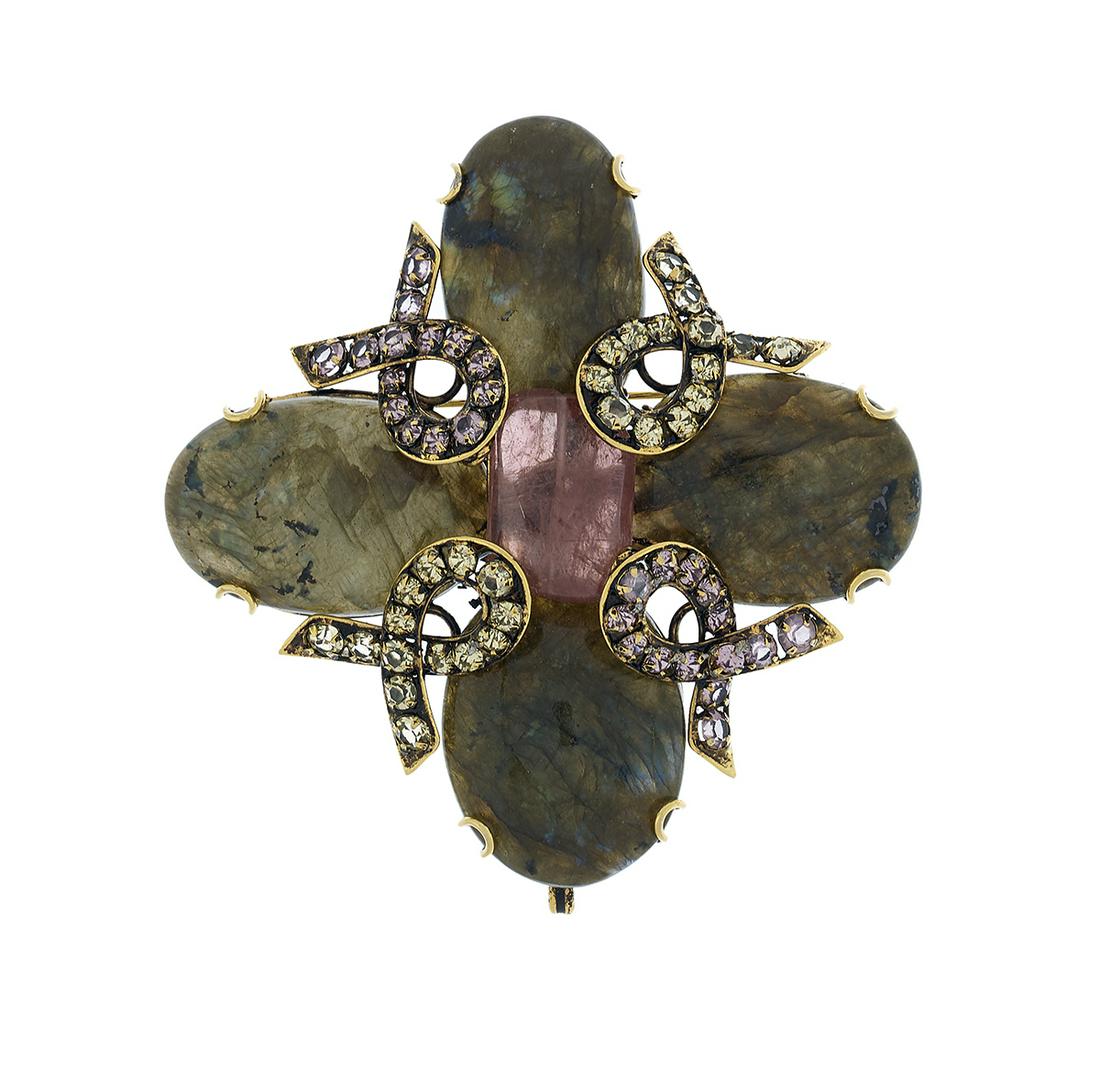 Iradj Moini Brooch/Pendant: Iradj Moini Brooch/Pendant the large brooch/pendant mounted with labradorite cabochons for the "petals" and a tourmaline for the "center", stamped "Iradj Moini". l. 3-3/4"
