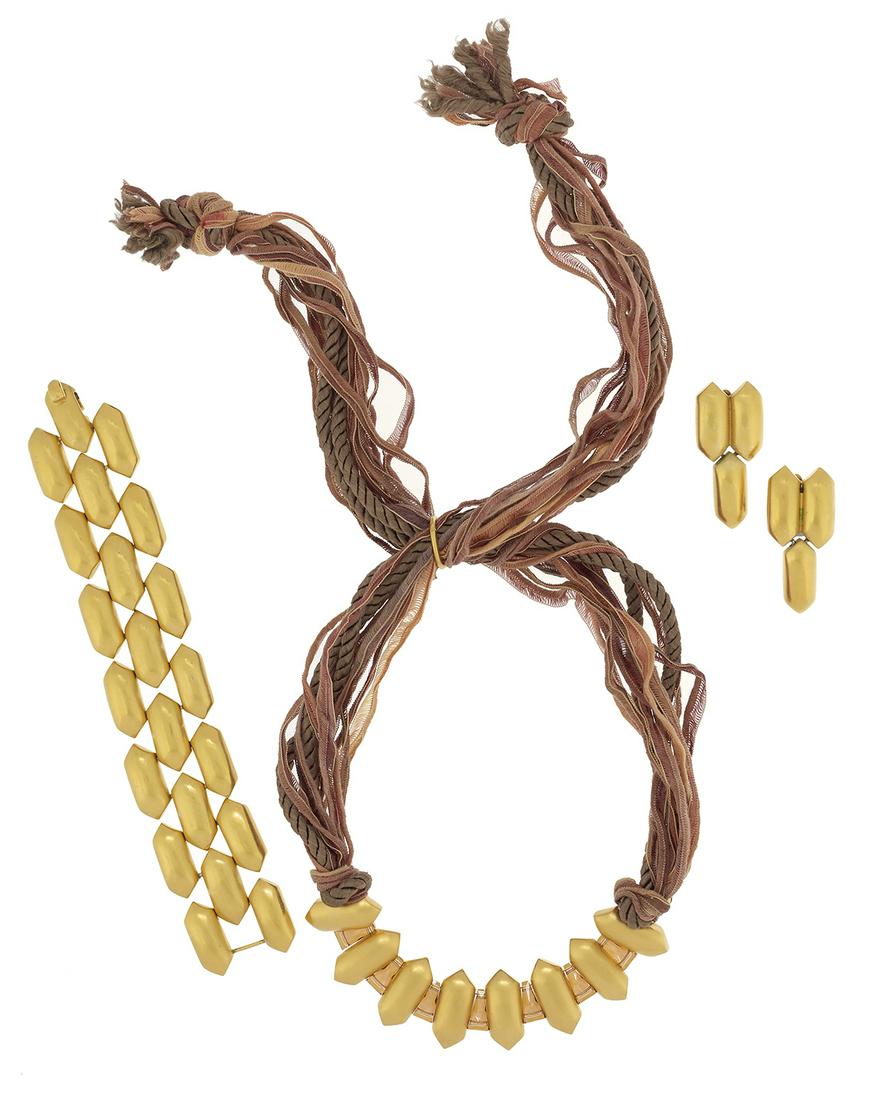 Three-Piece Mignon Faget Jewelry Suite: Three-Piece Mignon Faget Jewelry Suite the suite comprised of a bracelet, w. 1-1/4", l. 7", a pair of earrings, l. 1-7/8", and an adjustable necklace, l. 16" to 26", all stamped with the Mignon Faget 