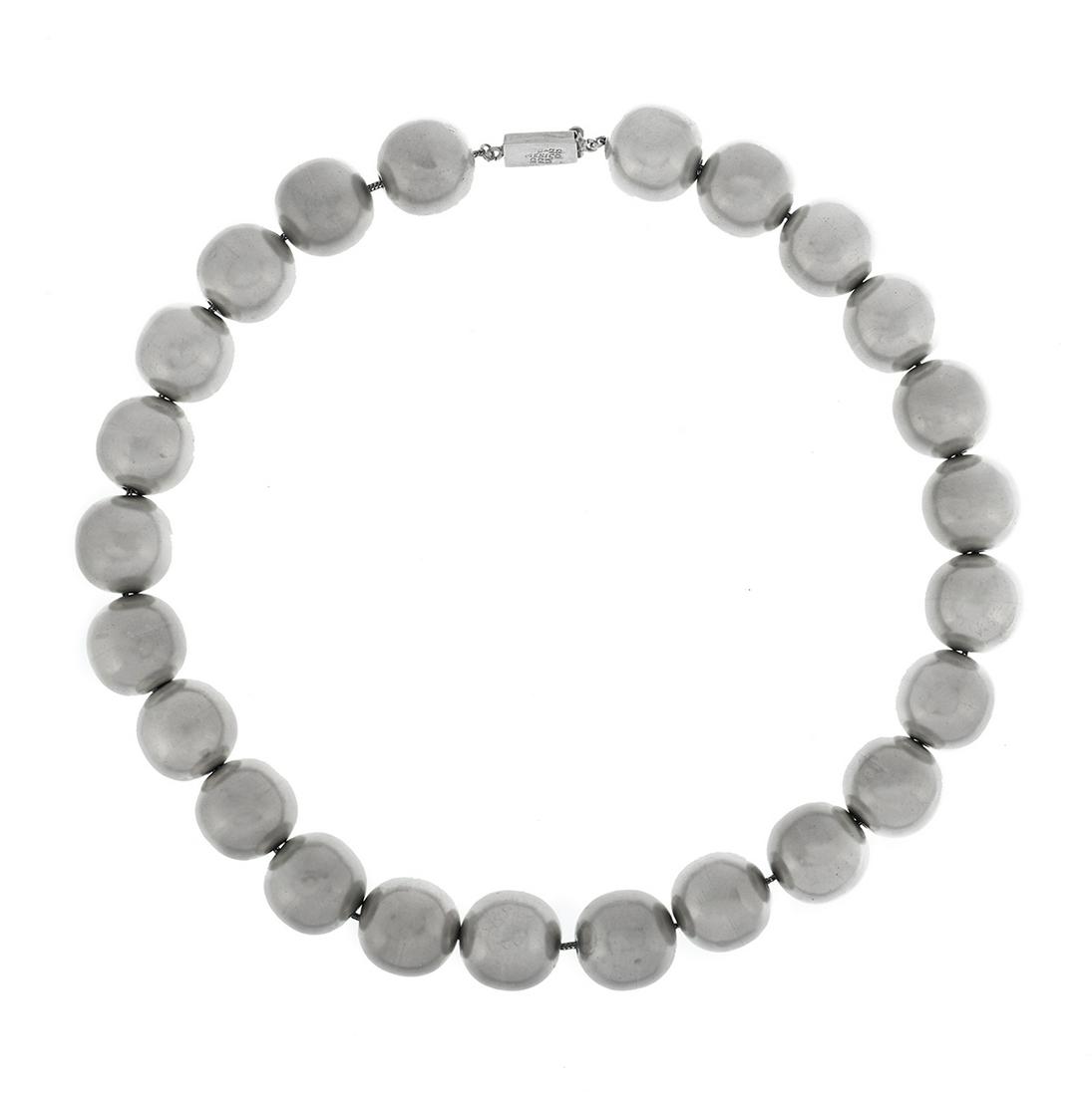 Large Silver Necklace: Large Silver Necklace sterling silver, the necklace composed of 20.0 mm silver balls. l. 20", total weight 151.7 grams Provenance: Estate of Sylvia Pugh Sullivan, Houston, Texas.