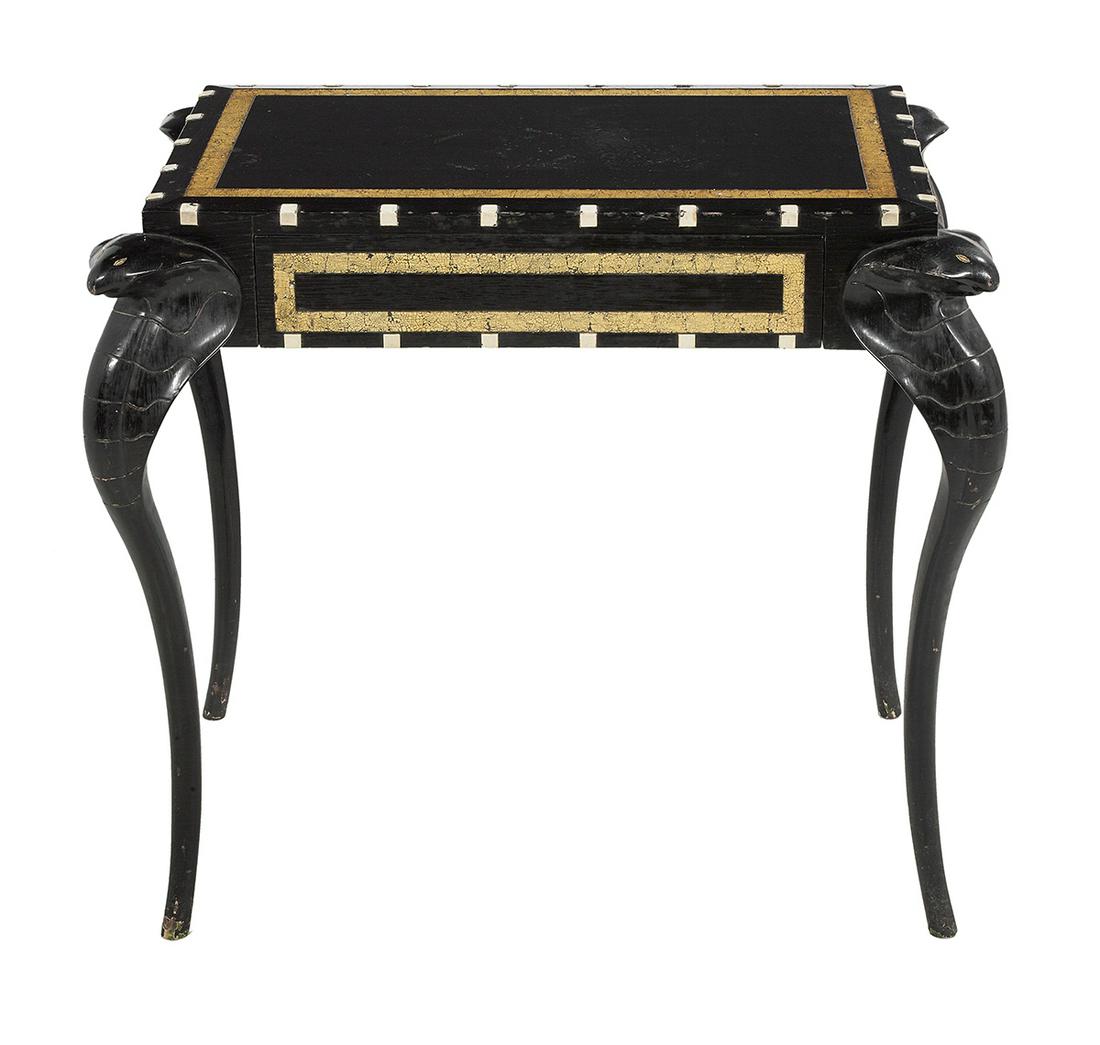 Art Deco-Style Bone-Mounted & Ebonized Table: Art Deco-Style Ebony, Bone-Mounted and Ebonized Table the perimeter and apron edges with bone mounts, the frieze with a single drawer, raised on four legs, each modeled in the form of a cobra. h. 27-1