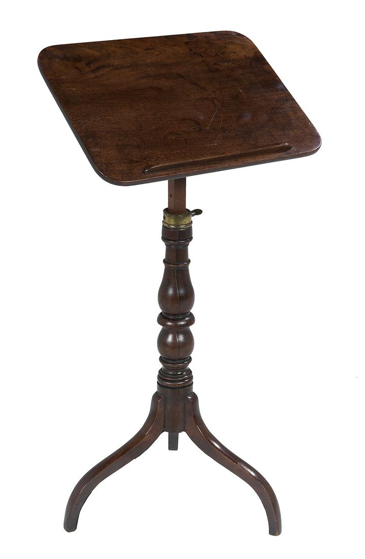 George III Mahogany Writing Slope: George III Mahogany Writing Slope fourth quarter 18th century, the rounded rectangular top with a lower rail, the angle and height both adjustable, and raised on a turned and bulbous standard to three