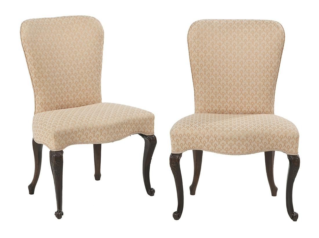 Pair of George III-Style Mahogany Chairs: Pair of George III-Style Mahogany Occasional Chairs each with an upholstered back and broad serpentine seat, raised on foliate-carved cabriole legs ending in French toes. h. 35-1/4"
