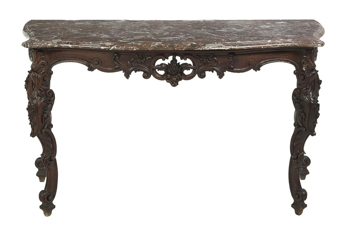 Italian Rococo Oak and Marble-Top Side Table: Italian Rococo Oak and Marble-Top Side Table 18th century, the shaped rectangular marble top with a molded edge, above a conforming shaped and foliate-carved, fruit-centered frieze, raised on foliate-