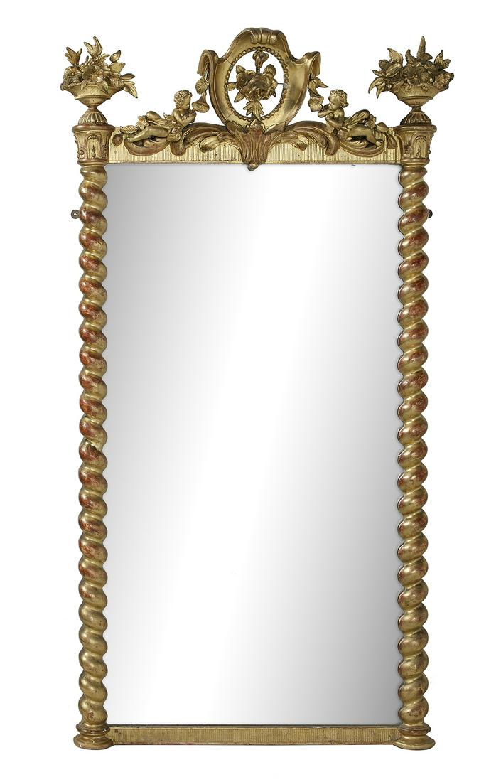 Unusual Louis-Philippe Pier Mirror: Unusual Louis-Philippe Pier Mirror in the Rococo Revival Taste second quarter 19th century, the sides with spiral-reeded pilasters, the crest with a pierced shield decorated with roses and trailing mo