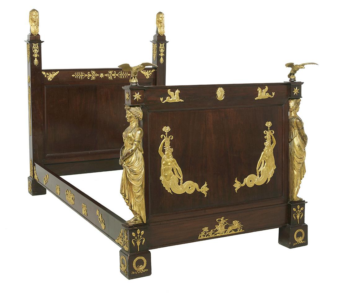 Empire-Style Gilt-Bronze-Mounted Mahogany Bed: Good Empire-Style Gilt-Bronze-Mounted Mahogany Bed ca. 1900, the headboard with a framed panel and ormolu-mounted posts and Egyptian figural finials, the footboard with large carved and gilded figures