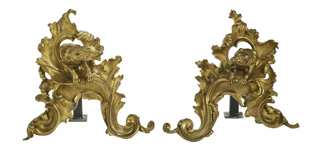 Pair of Unusual French Bronze Figural Chenets: Pair of Unusual French Bronze Figural Chenets fourth quarter 19th century, in the rococo style, molded with pierced rocaille work, a snarling dog mounted on each example. h. 13", d. 13", d. 6-3/4"