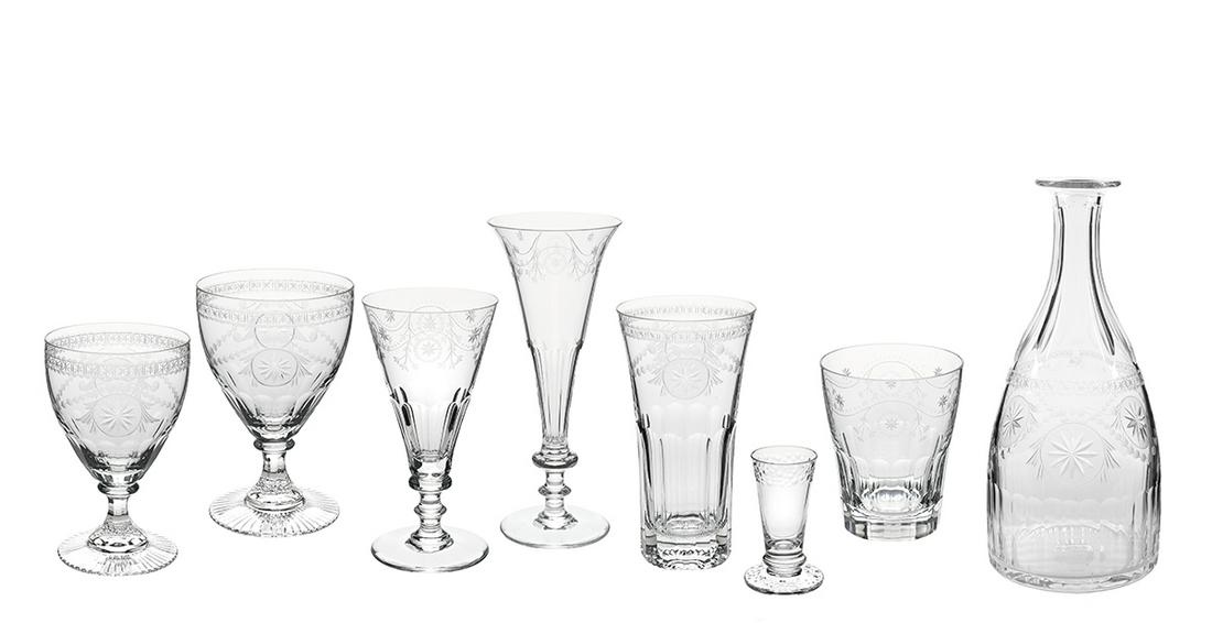William Yeoward Glassware Set: Extensive Partial William Yeoward Crystal Glassware Set in the "Pearl" and "Bunny" Patterns 20th/21st century, English, comprising in the "Pearl" pattern: seventeen water goblets, h. 6-1/8", nineteen