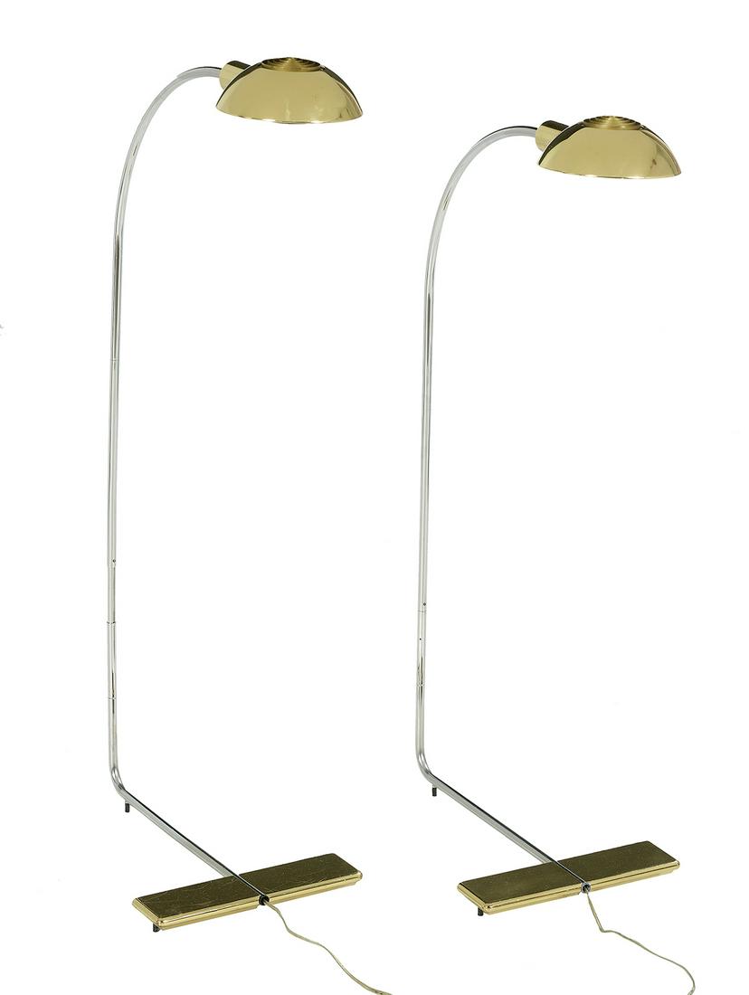 Pair of Cedric Hartman Floor Lamps: Pair of Cedric Hartman Chrome and Brass Floor Lamps second half 20th century, both with adjustable arched chrome standards, rounded shades with concentric vents, diffusing inserts and lucite turn swi