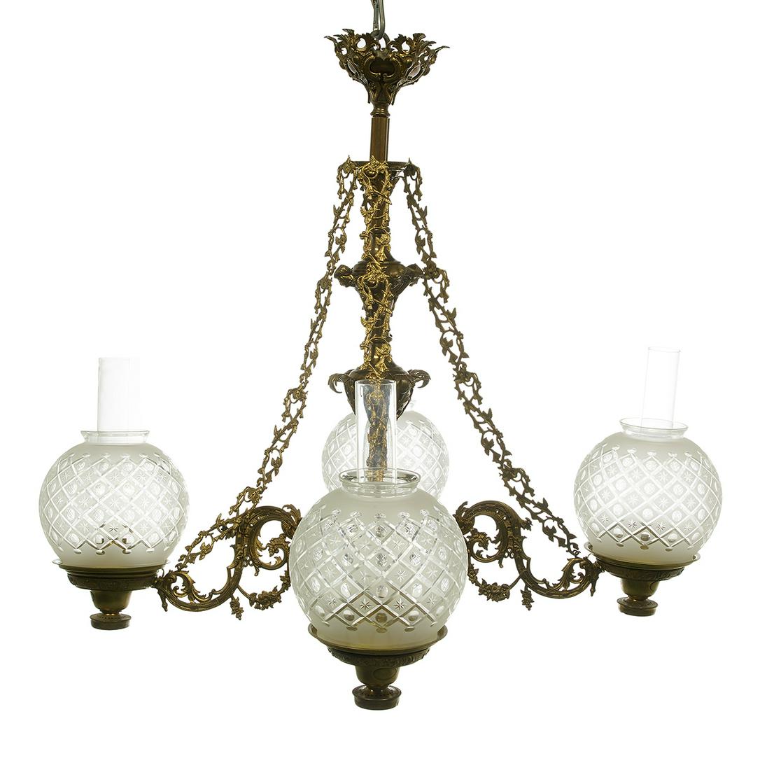 Cornelius & Baker Solar Chandelier: Cornelius & Baker Brass and Bronze Solar Chandelier ca. 1851-1861, Philadelphia, in the rococo revival style, the standard decorated with applied scrollwork, the solar tanks labeled "Cornelius & Baker