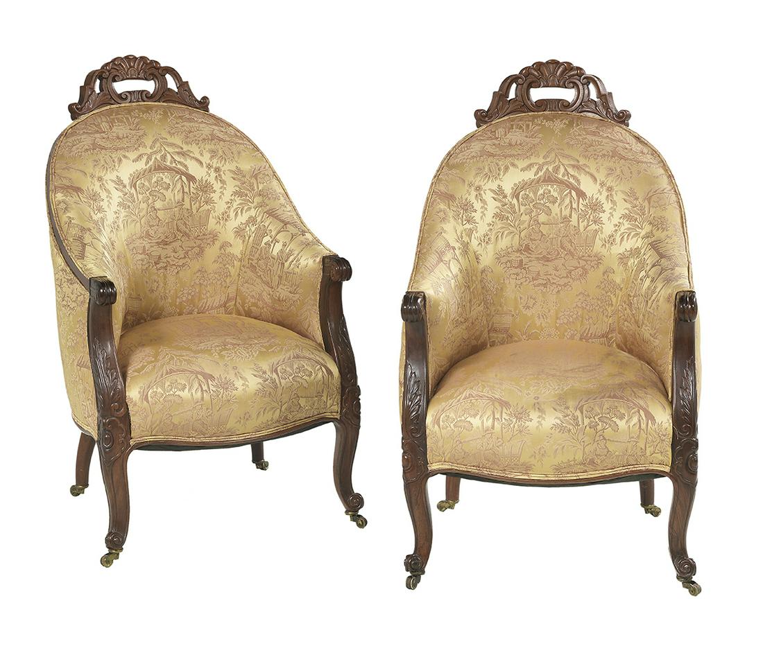 Pair of American Rosewood Armchairs: Pair of American Transitional Late Classical to Rococo Revival Rosewood Armchairs second quarter 19th century, each of gondola form with closed upholstered arms terminating in foliate- and scroll-carv