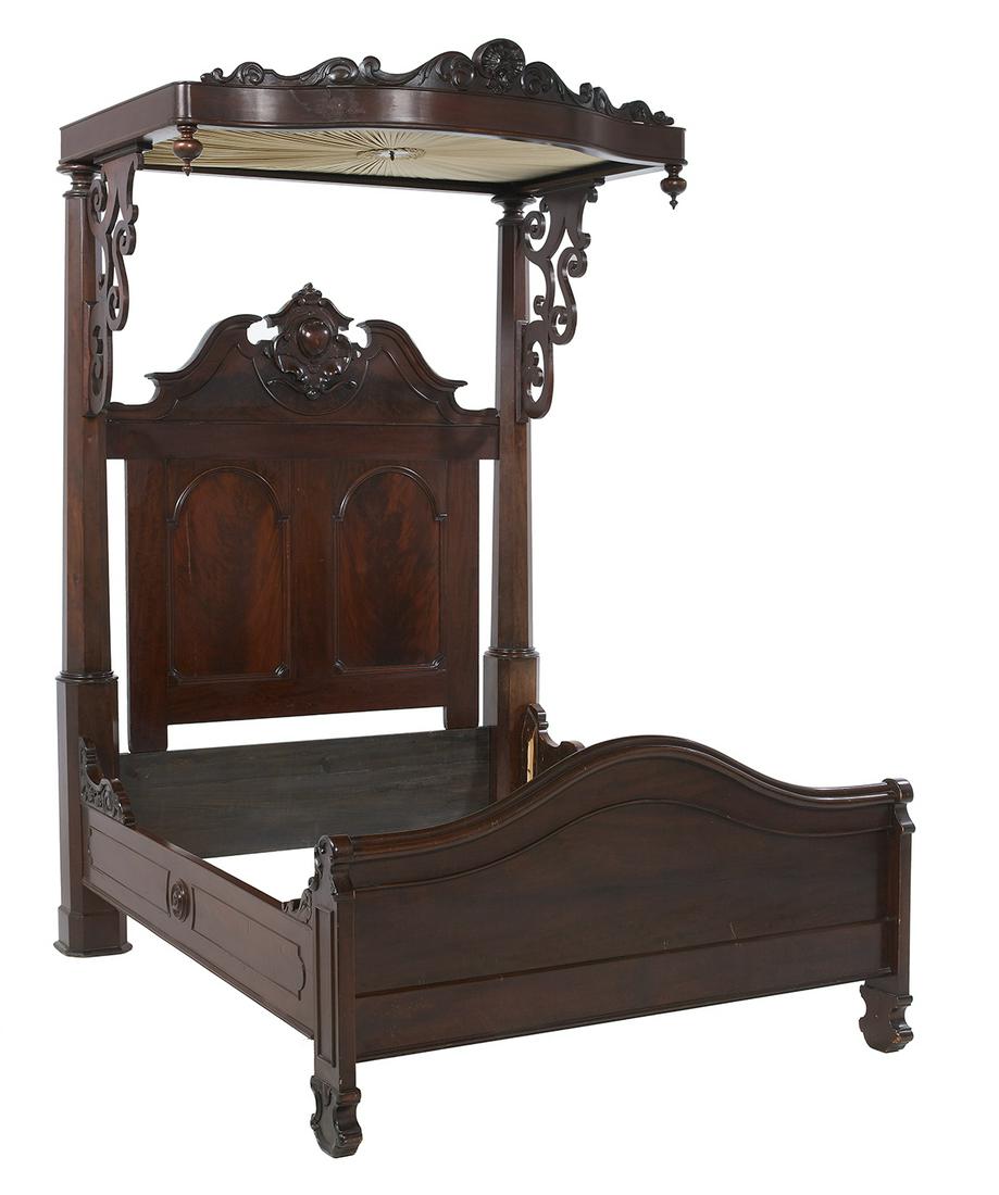American Rococo Revival Mahogany Half-Tester Bed: American Rococo Revival Mahogany Half-Tester Bed third quarter 19th century, the tester with a carved crest over a serpentine front, supported by scrolling brackets joined to octagonal posts, the head