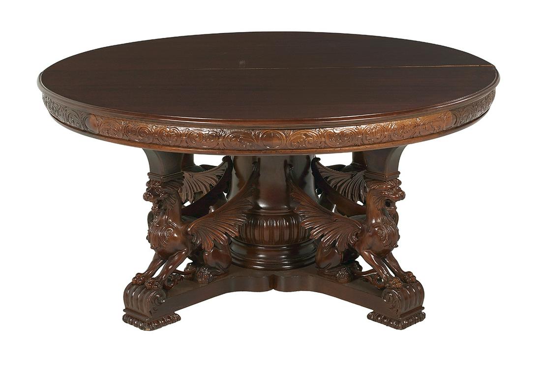 American Three-Piece Mahogany Dining Suite: American Late Victorian Three-Piece Mahogany Dining Suite ca. 1900, in the manner of R. J. Horner, comprised of a banquet table, a sideboard/buffet and a curved glass china cabinet, the circular table