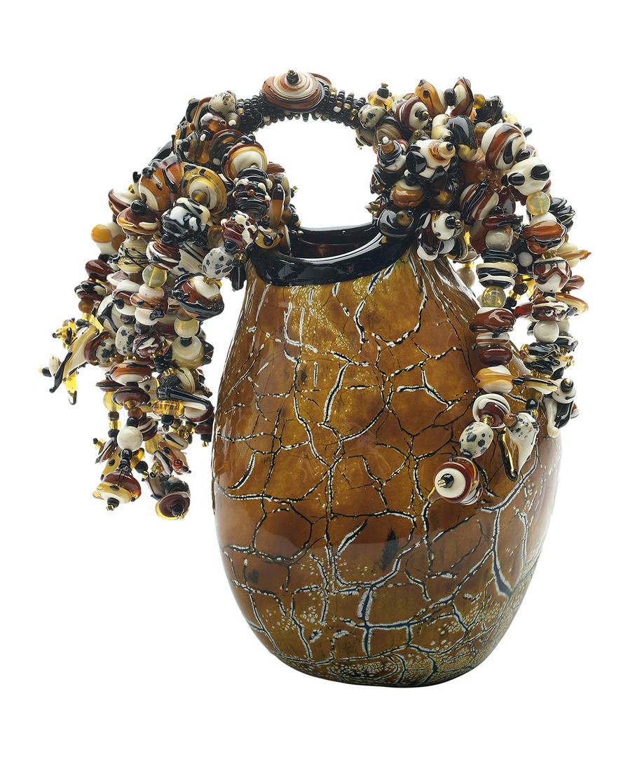 Laura Donefer (USA, b. 1955): Laura Donefer (American, b. 1955) "Amulet Basket" blown and flame-worked glass rich earth tones of browns and tans, unmarked. h. 8", w. 6-1/2", d. 4"
