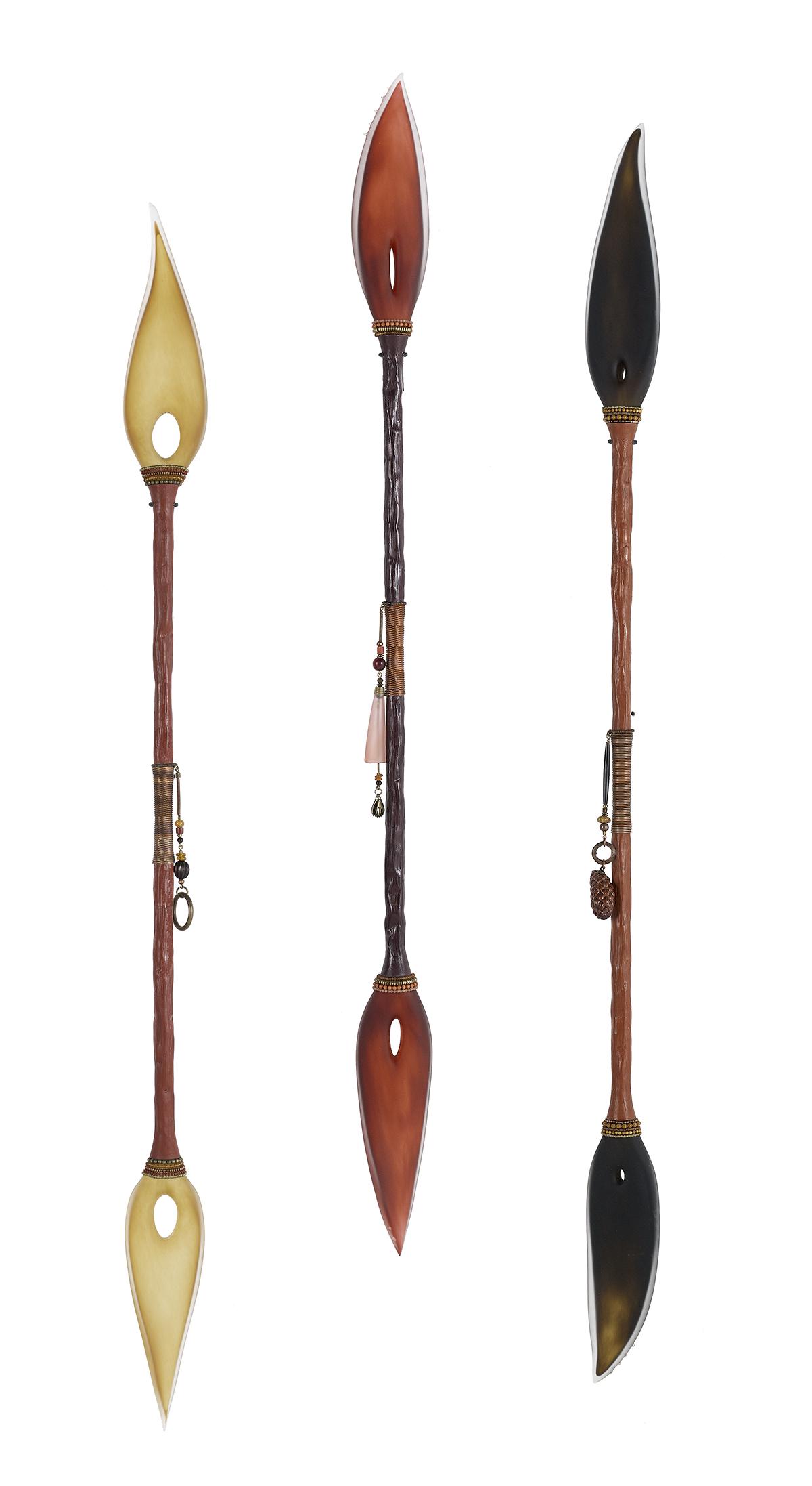 Jenny Pohlman & Sabrina Knowles (US, contemporary): Jenny Pohlman (American, b. 1960) Sabrina Knowles (American, b. 1955) "Untitled - Three Spears" sculpted and polished glass with metal, beads and West African findings, in yellow, amber and olive brow