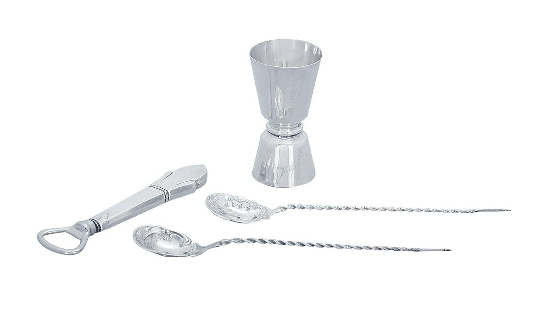 Four Pieces of American Sterling Silver Barware: Four Pieces of American Sterling Silver Barware mid-20th century, including: an S. Kirk & Son, Baltimore, Maryland double jigger, h. 3-3/4", dia. 2"; a pair of olive spoons with rococo-edged, star-pie
