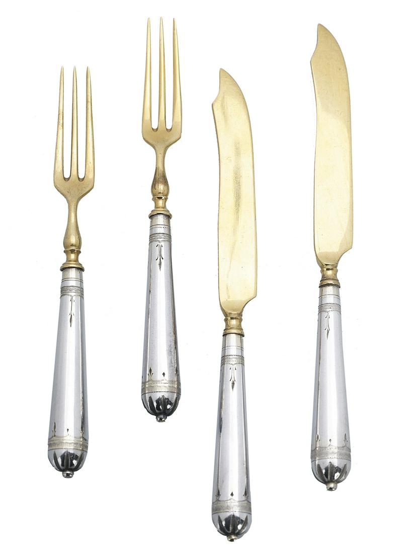 BMF Gilt and Silverplate Dessert Set: BMF Gilt and Silverplate Dessert Set second quarter 20th century, by the Berndorfer Metallwarenfabrik, including twelve dessert forks with three gilt prongs, and twelve dessert knives with gilt scimit