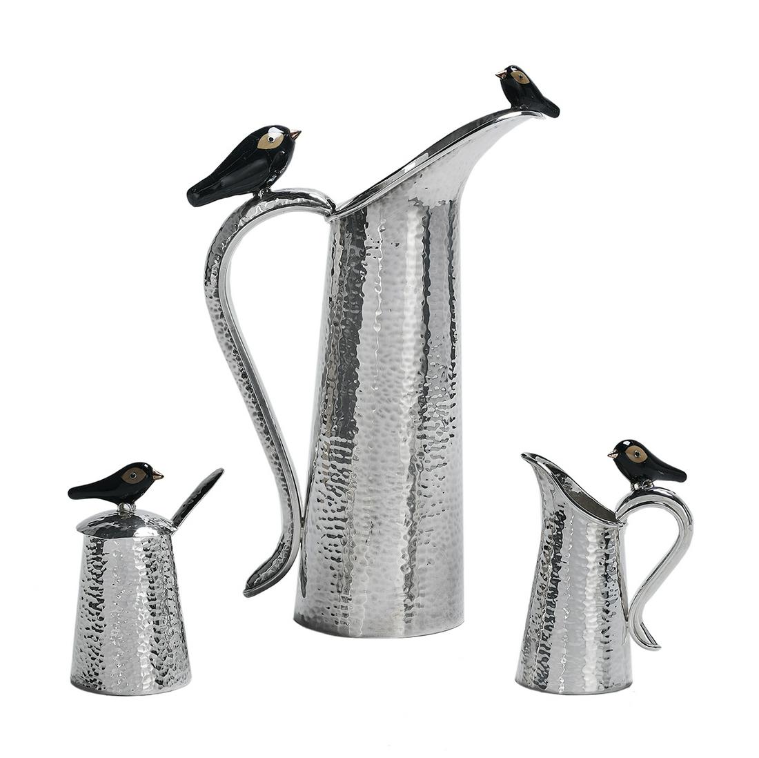 Emilia Castillo Silverplate "Blackbird" Tableware: Three Pieces of Emilia Castillo Silverplate "Blackbird" Tableware contemporary, Taxco, Mexico, including: a pitcher, h. 14-1/2", dia. 4-1/2"; a cream jug, h. 6", dia. 2-3/4"; and a covered sugar bowl,