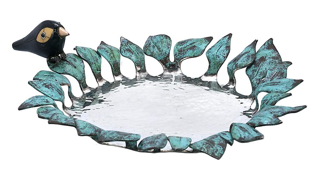 Emilia Castillo "Blackbird" Wine Coaster: Emilia Castillo Silverplate "Blackbird" Wine Coaster contemporary, Taxco, Mexico, of circular form with hammered finish, the rim banded with verdigris-finished leaves perched with an onyx blackbird. h