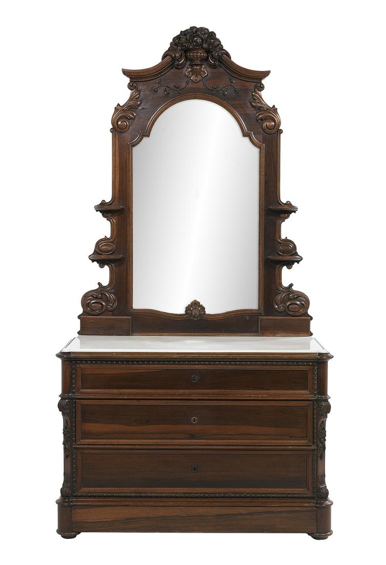 American Rococo Revival Rosewood Dresser: American Rococo Revival Rosewood Dresser third quarter 19th century, in the manner of those sold by Prudent Mallard, New Orleans, in two parts, the upper section with an arched mirror plate set in a f