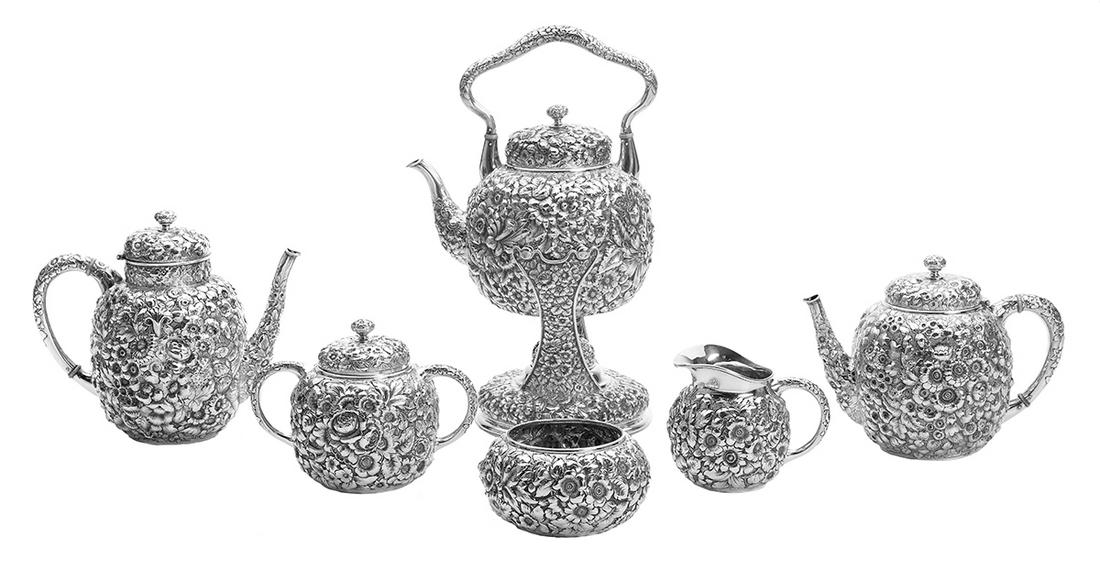 George W. Shiebler Sterling Silver Tea Set: George W. Shiebler Sterling Silver Tea Set fourth quarter 19th century, New York, New York, including: a kettle-on-stand, h. 14-1/2", dia. 8"; a teapot, h. 7", dia. 6"; a coffeepot, h. 8", dia. 6"; a