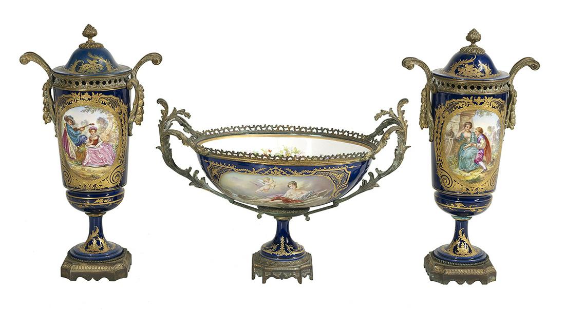 Assembled Sevres-Style Porcelain Garniture Set: Assembled Three-Piece Sevres-Style Ormolu-Mounted Porcelain Garniture Set 19th century, including a pair of cylindrical-form lidded vases with hand-painted courting scenes, signed "Henry" and bearing 
