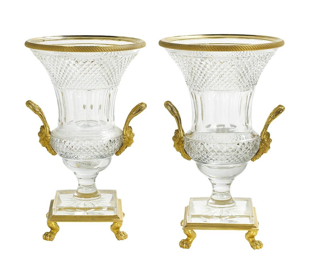 Pair of French Cut Crystal and Gilt-Metal Urns: Pair of French Empire-Style Cut Crystal and Gilt-Metal Urns 20th century, attributed to Cristal Seiler, Paris, the diamond-cut campana-form urns with gilt engine-turned metal rims, masque-molded handl