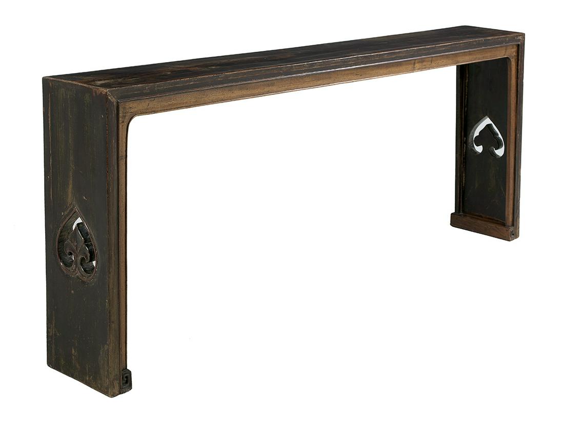 Chinese Elmwood Altar Table: Chinese Elmwood Altar Table 18th century, with a single-plank top and sides, the ends with a pierced and carved ruyi. h. 35", w. 85", d. 11-1/2"