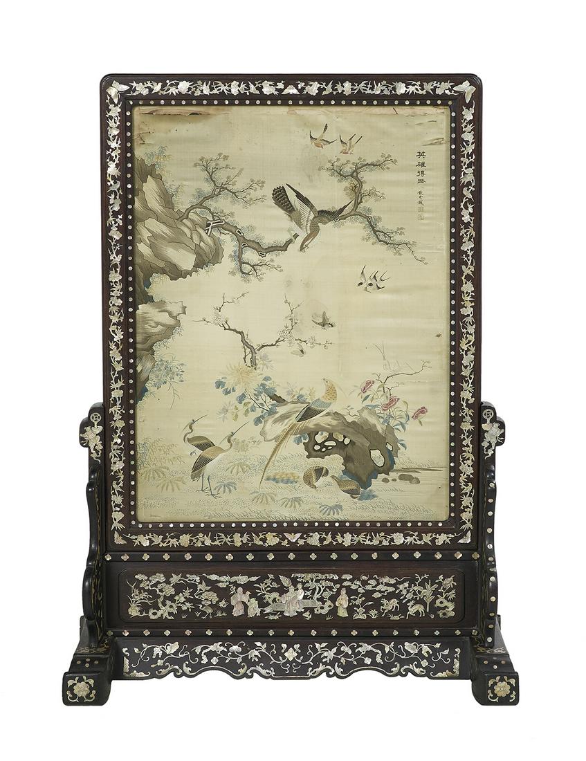 Chinese Rosewood & Silk-Embroidered Table Screen: Chinese Rosewood, Mother-of-Pearl and Silk-Embroidered Table Screen 19th century, the silk panel finely embroidered and depicting "The Hundred Birds", the frame and stand profusely inlaid with mother-