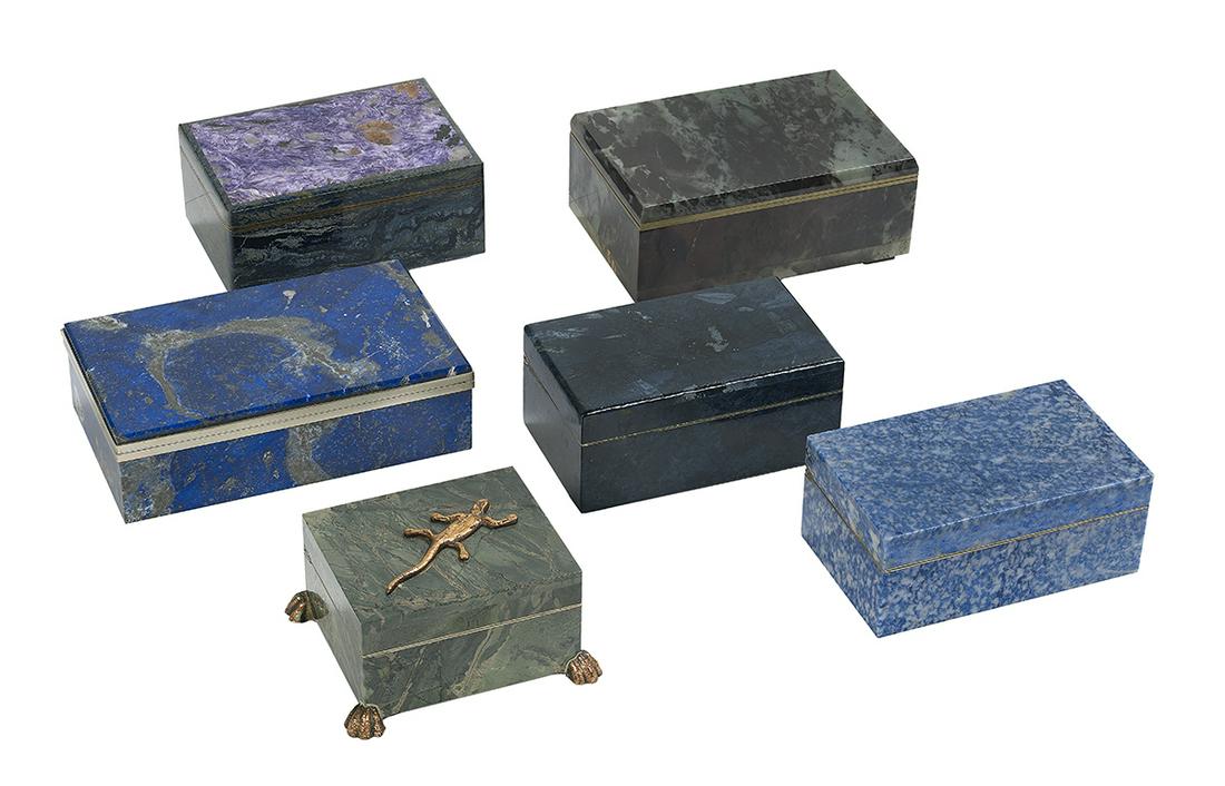 Collection of Six Stone Boxes: Collection of Six Stone Boxes including an example with a charoite cover and marble sides, three lapis lazuli boxes, a green marble box, and a green and tan marble box with a copper salamander mount a
