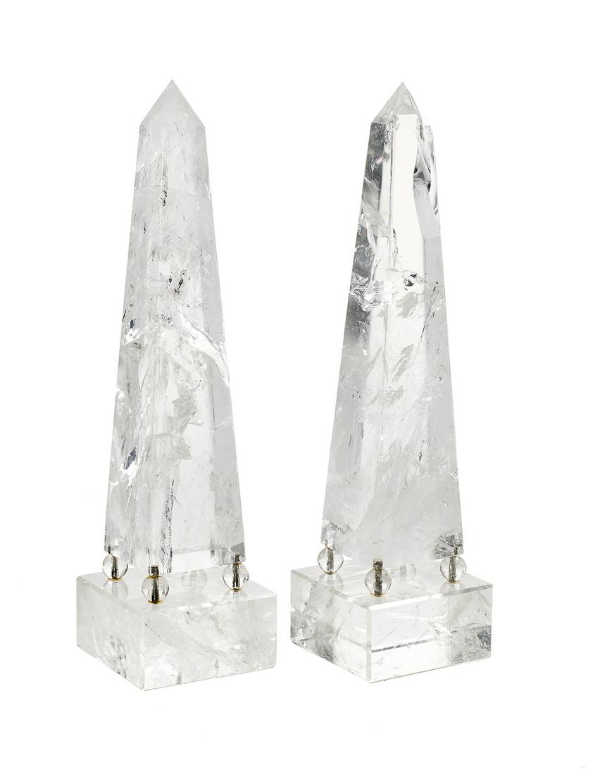 Pair of Rock Crystal Obelisks: Pair of Rock Crystal Obelisks 20th century, probably French, each example resting on spheres above a rectangular base. h. 17", w. 4-1/2", d. 4-1/2" Provenance: The Estate of The Honorable Lloyd & Bery