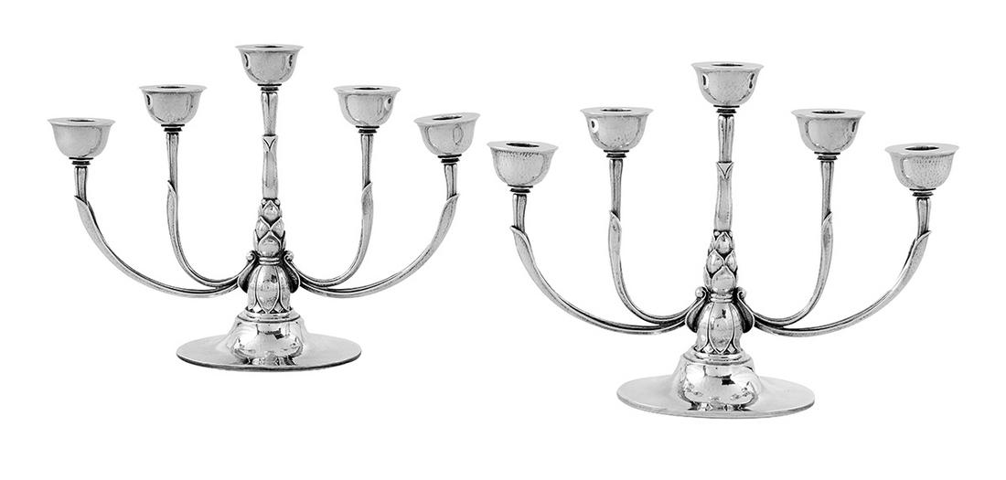 Pair of Georg Jensen Sterling Silver Candelabra: Pair of Georg Jensen Sterling Silver Candelabra 1933-1944, Copenhagen, Denmark, model 537A, designed by Harald Nielsen (1892-1977), each with an imbricate floral standard with two pairs of outscrolled