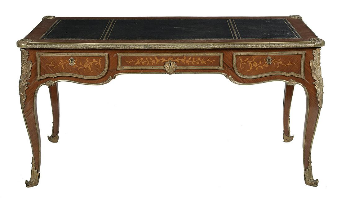 Louis XV-Style Inlaid Mahogany Bureau Plat: Louis XV-Style Inlaid Mahogany Bureau Plat with an inset tooled leather top over a frieze with a central drawer flanked by a pair of drawers, each with foliate inlay and ormolu mounts, raised on cabri