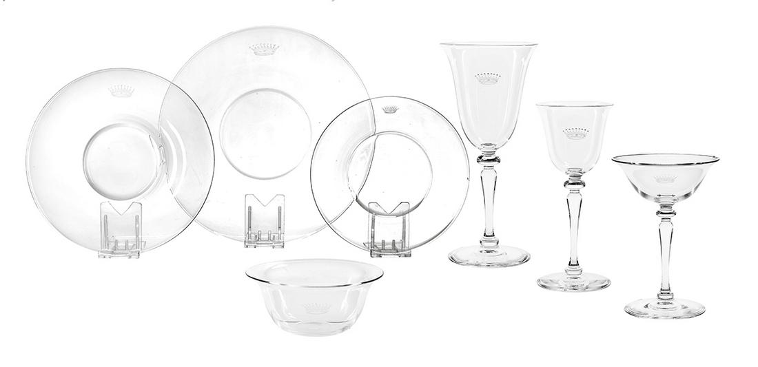 Crown-Engraved Carder/Steuben Crystal Tableware: Partial Service of Crown-Engraved Carder/Steuben Crystal Tableware post-1933, Frederick Carder, Corning, New York, including fifteen red wine goblets, h. 6-3/4", twenty champagne coupes, h. 5-3/4", on