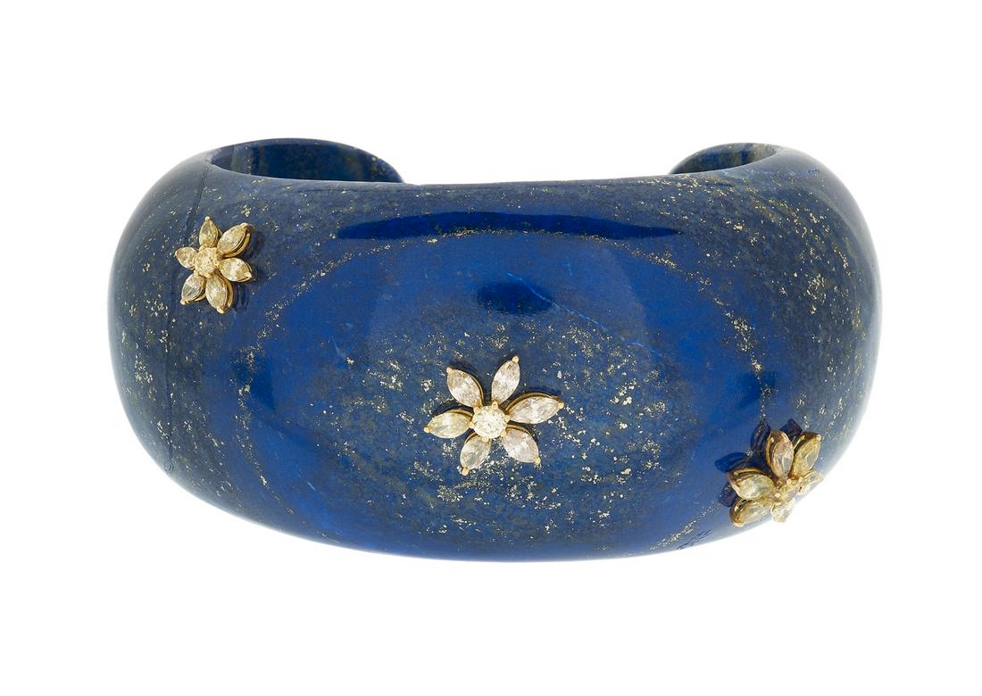 Eli Frei Lapis Lazuli Diamond Cuff Bracelet: Eli Frei Lapis Lazuli Diamond Cuff Bracelet 18k yellow gold, the solid lapis lazuli bracelet mounted with round brilliant-cut Fancy Yellow and Fancy Light Yellow diamonds weighing approximately 1.50 c