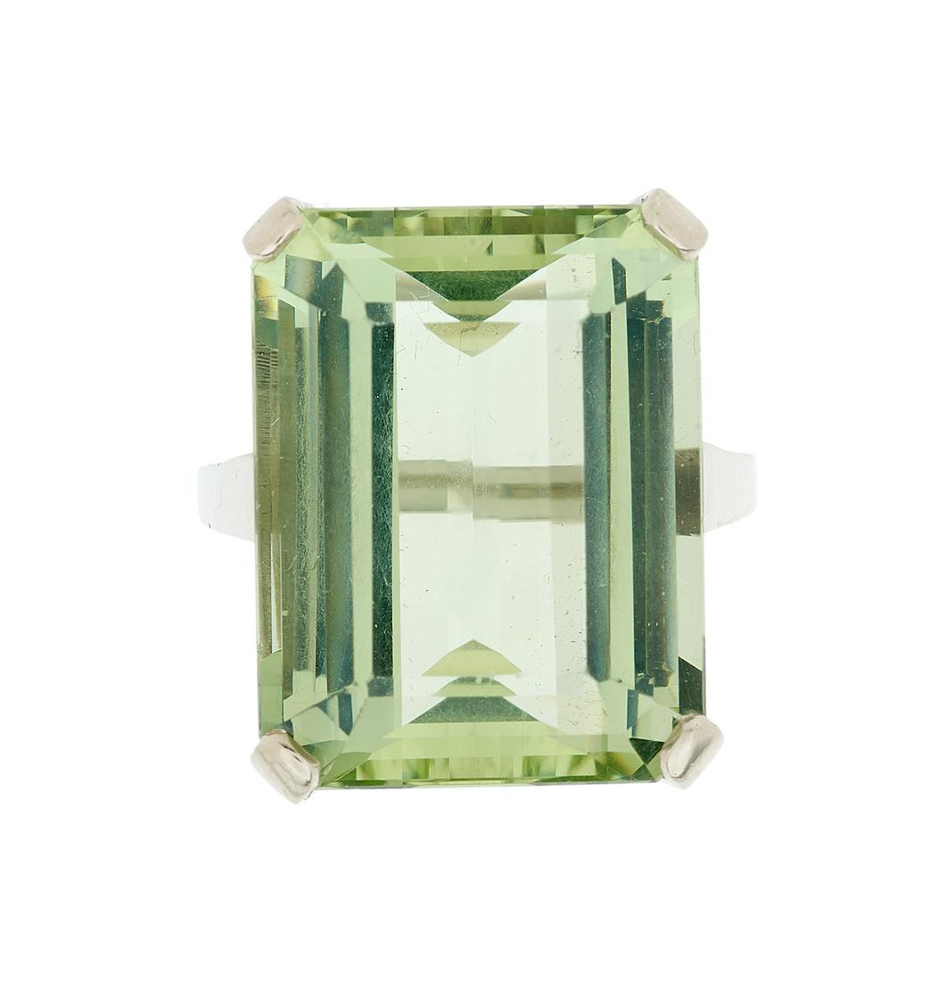 Large Beryl Ring: Large Beryl Ring 10k white gold, the ring mounted with an emerald-cut light green beryl weighing approximately 20.87 carats. size 6, total weight 10.9 grams