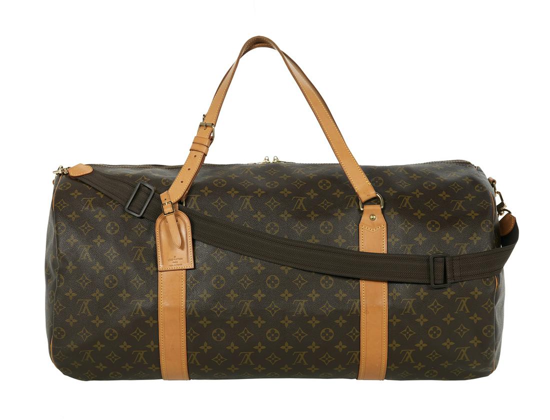 Louis Vuitton Monogram "Sac Polochon" Travel Bag: Vintage Louis Vuitton Monogram "Sac Polochon" Travel Bag 1994, France, the bag with a coated canvas exterior and brown fabric-lined interior, with Vachetta leather trim, brass hardware, luggage tag an