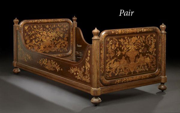 Pair of Dutch Mahogany and Marquetry Daybeds: Pair of Dutch Mahogany and Marquetry Daybeds, early 20th century, each with a domed footboard and headboard, with a rounded crest over an elaborately floral- and foliate-inlaid panel, flanked to eithe