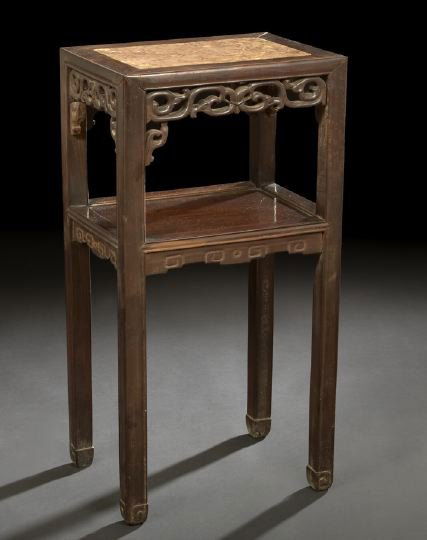 Chinese Rosewood and Marble Side Table: Chinese Rosewood and Rouge Marble Side Table, 19th century, of rectangular outline, the inset rouge marble top above a carved floral fretwork apron, raised on squared legs joined by a central shelf wi