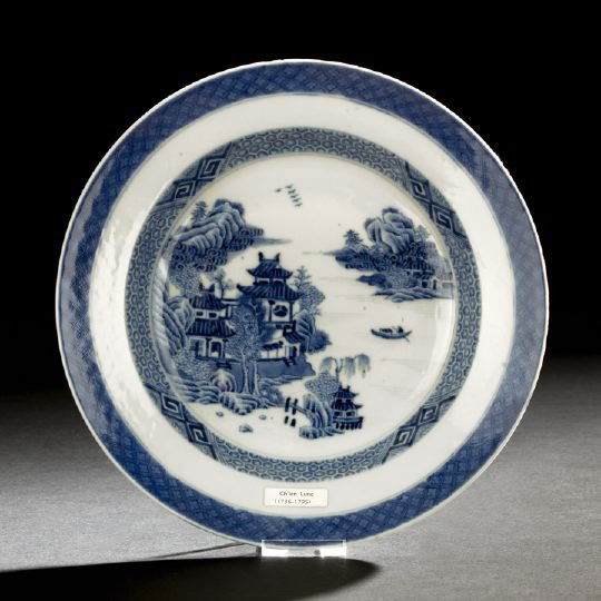Chinese Export Blue & White Deep Dish: Chinese Export Blue and White Porcelain Deep Dish, Qianlong Reign (1736-1795), of European shape, decorated with a central design of pagodas by a lake with a loan boatman, bordered by a brocade border