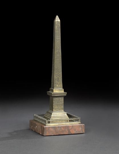 French "Grand Tour" Bronze Model of an Obelisk: French "Grand Tour" Gilt- and Patinated Bronze Model of an Egyptian Obelisk, third quarter 19th century, presented on a square rouge royale marble base fitted with a bronze fence, h. 10-1/2".