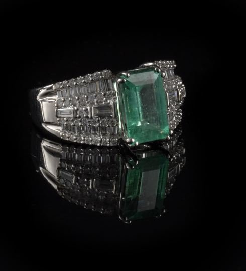18 Kt. Gold, Emerald and Diamond Lady's Ring: Eighteen-Karat White Gold, Emerald and Diamond Lady's Ring, composed of a central rectangular step-cut emerald weighing 1.82 carats, VS-1 clarity, in a mount set with baguette and round brilliant-cut 